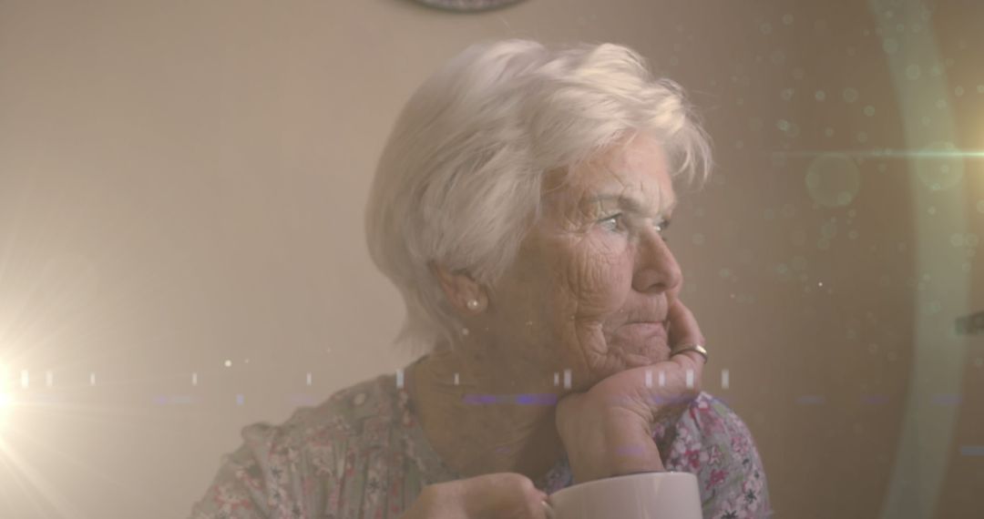 Reflective Senior Woman Contemplating Retirement while Sipping Tea