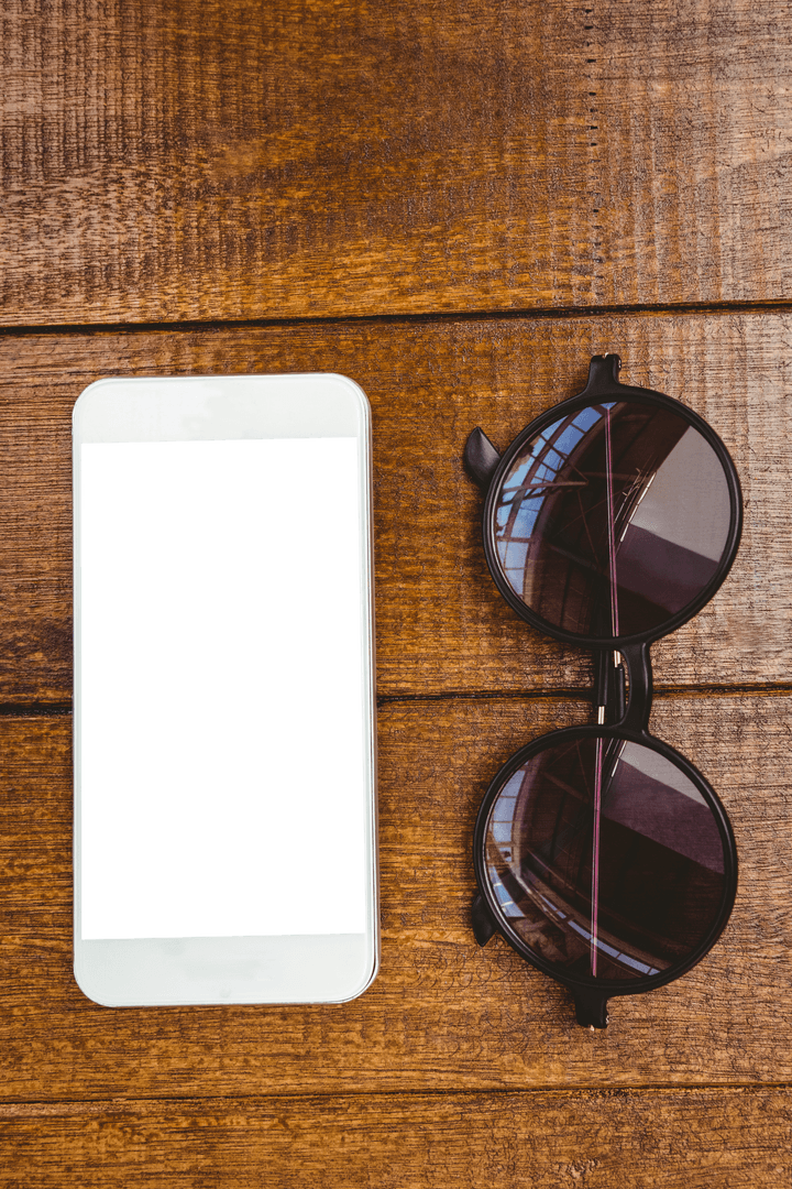Transparent Smartphone and Sunglasses on Rustic Wood