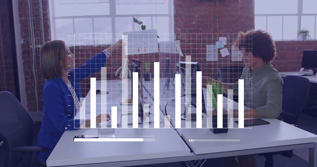 Coworkers Collaborating in loft office with Digital Bar Chart Overlay