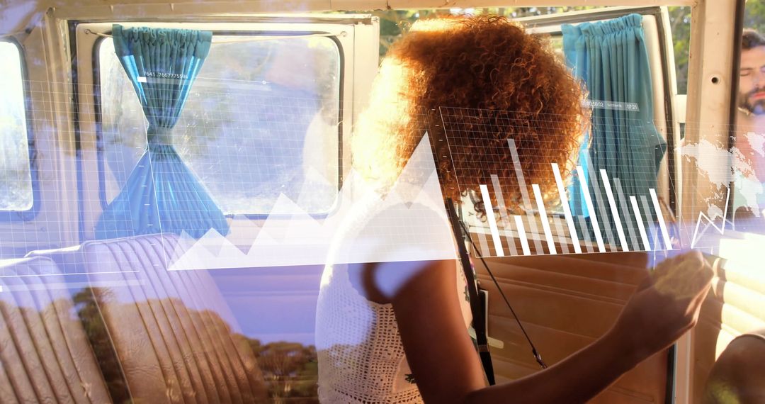 Woman Analyzing Data Overlays in Van with Digital Analytics