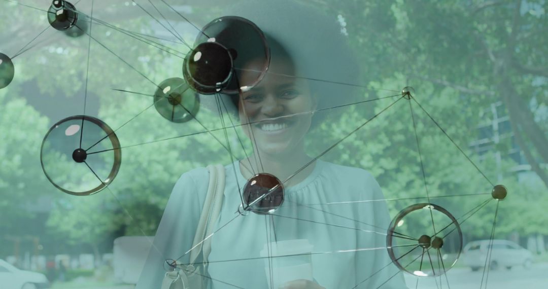 Stylish Woman Walking Along Urban Sidewalk with Coffee and Tote