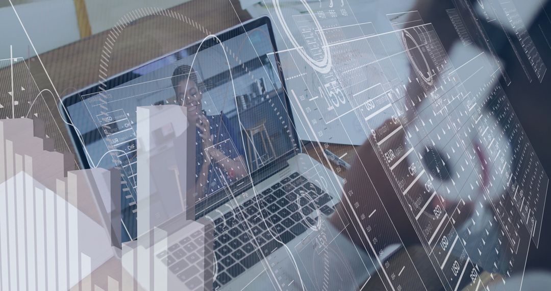 Businessman Analyzing Digital Data on Laptop at Desk