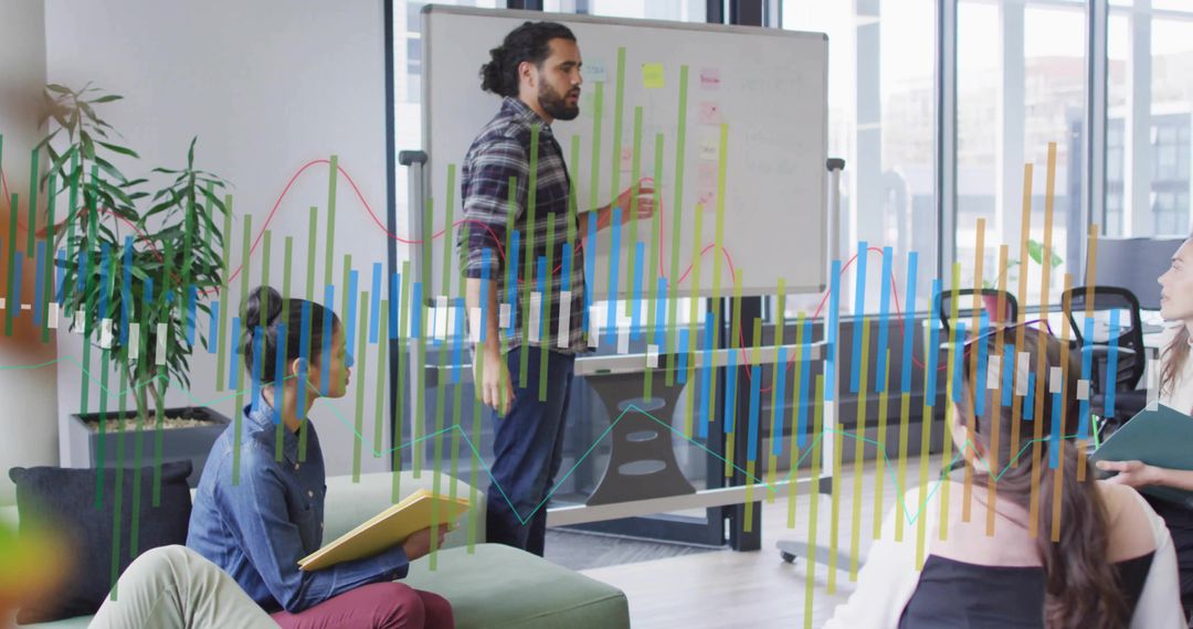 Team Brainstorming with Visual Charts in Modern Office Space