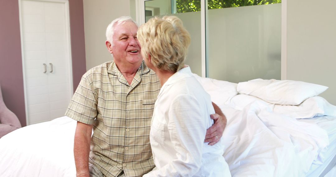 Senior Couple Enjoying Morning Together in Bedroom - Free Images, Stock Photos and Pictures on Pikwizard.com