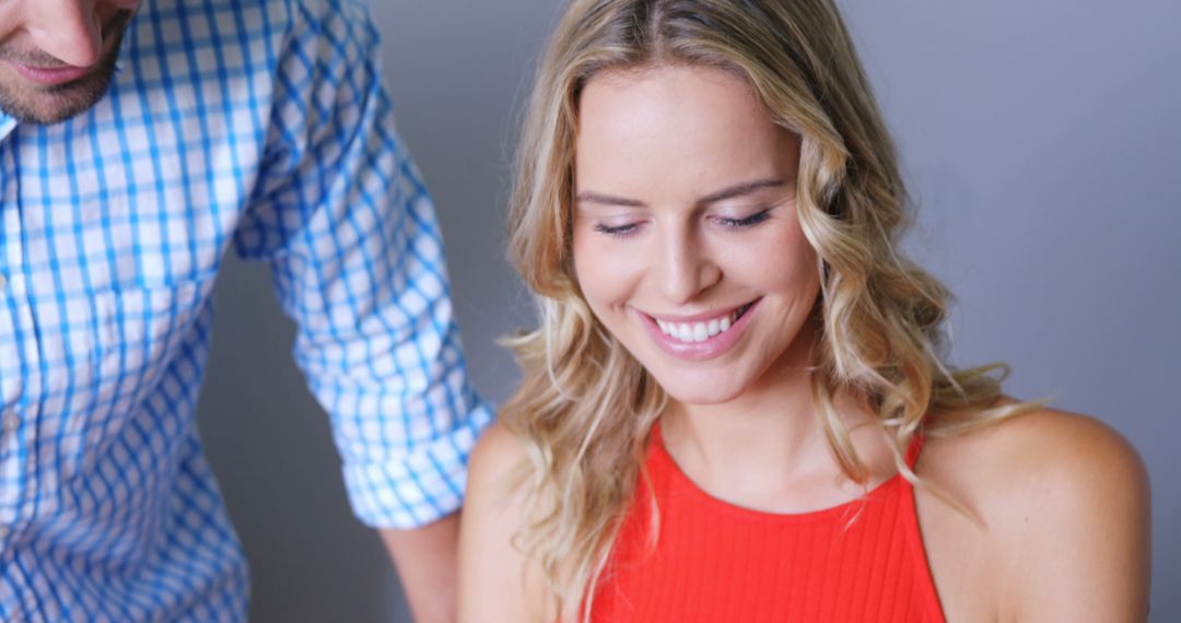 Joyful Couple Smiling in a Bright and Cheerful Home Setting