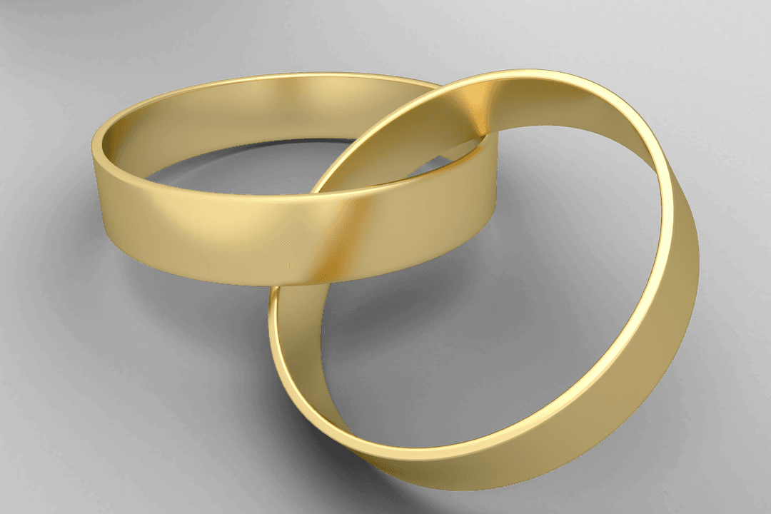 Close-Up of Elegant Transparent Gold Wedding Rings