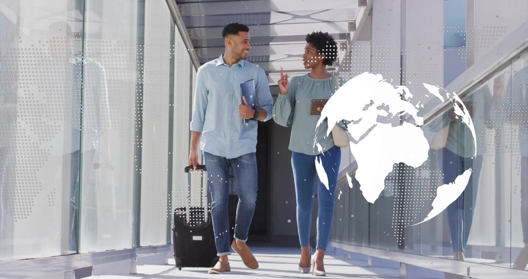 Two Busy Colleagues Collaborating in Airport Passage