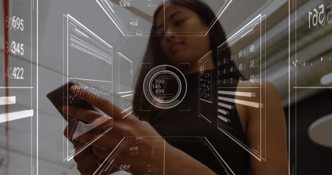 Woman Interacting with Holographic Data Interface in Modern Setting