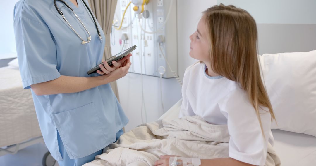 Nurse consulting with young patient in hospital bed - Free Images, Stock Photos and Pictures on Pikwizard.com