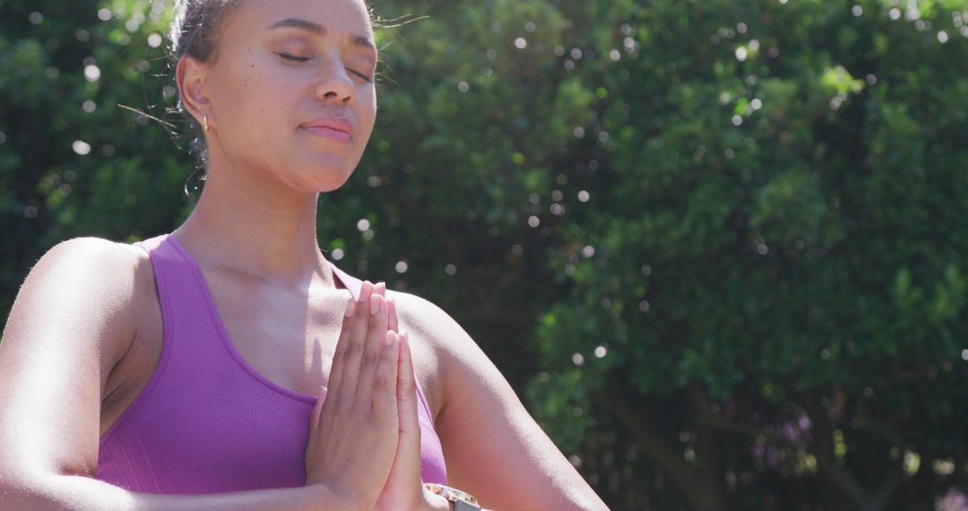 Young Woman Practicing Yoga Outdoors While Meditating - Free Images, Stock Photos and Pictures on Pikwizard.com