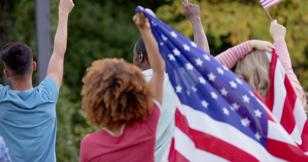 Group of Happy Diverse People Celebrating with American Flag Outdoors - Free Images, Stock Photos and Pictures on Pikwizard.com