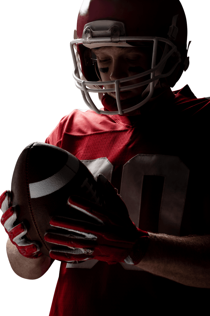 Transparent American Football Player Examines Football Holding in Pink Strap