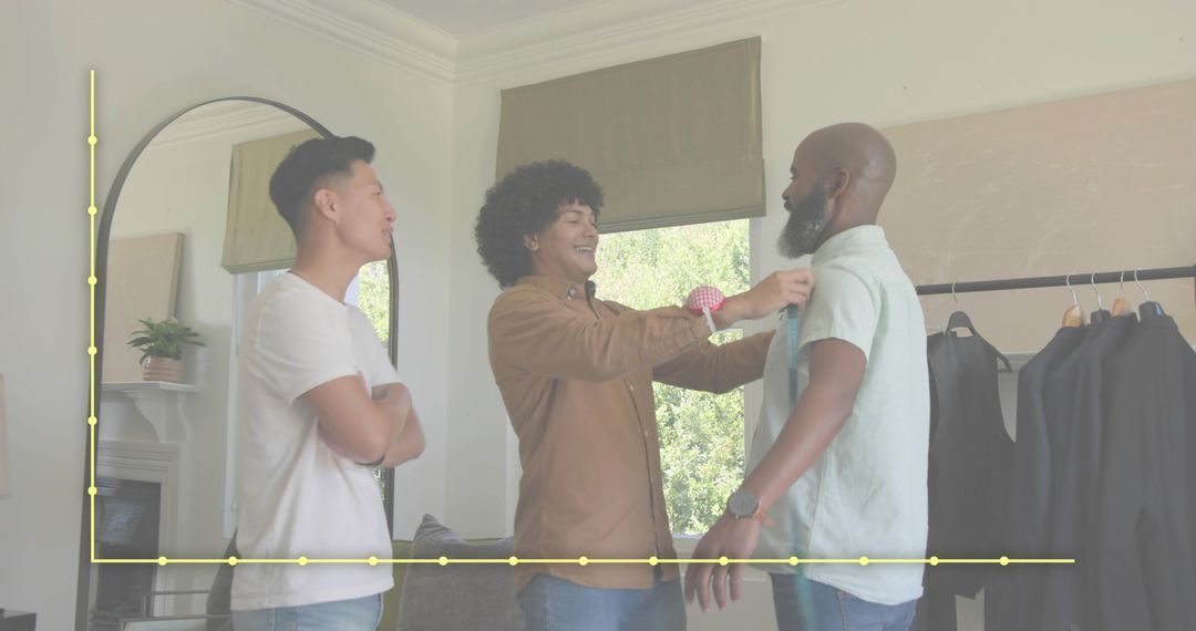 Tailoring consultation measuring bearded client with tape measure in boutique fitting room