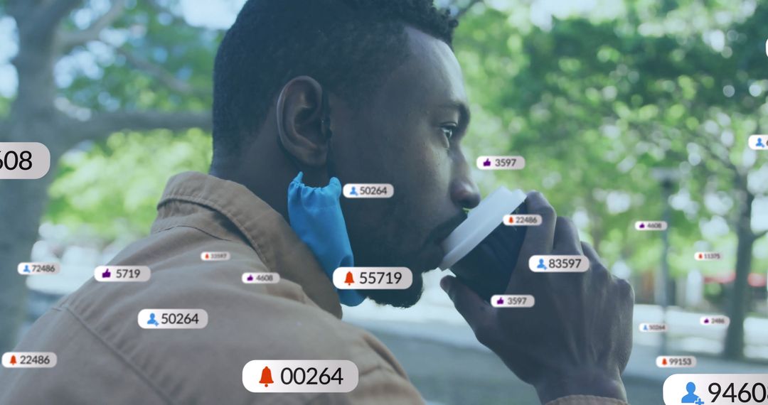 Modern Connection: Man Sipping Coffee with Floating Social Icons Outdoors
