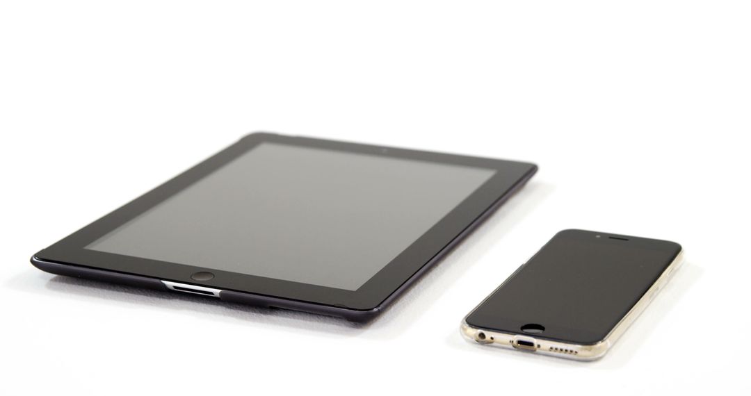 Close-Up of Tablet and Smartphone on White Background - Free Images, Stock Photos and Pictures on Pikwizard.com