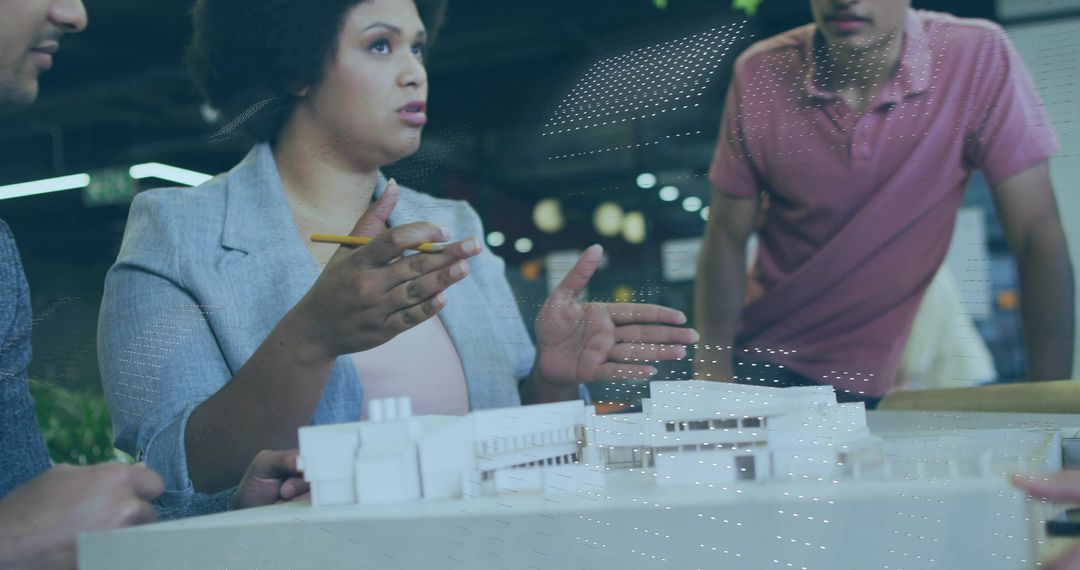 Diverse Architect Team Collaborating on Urban Design Project at Work Studio