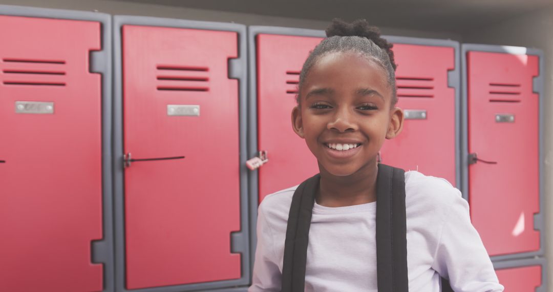 Smiling Girl in Front of School Lockers Ready for Class