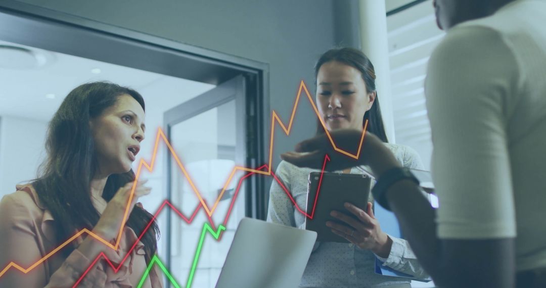 Diverse Team Working with Financial Data in Modern Office