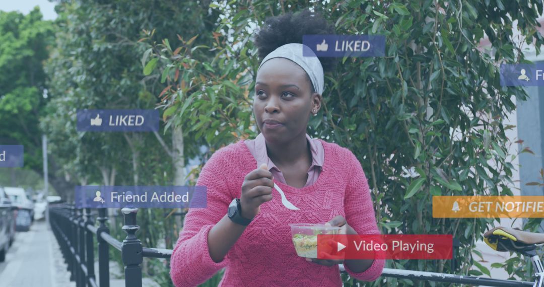 Image of social media notifications over african american woman eating takeaway in city street - Free Images, Stock Photos and Pictures on Pikwizard.com