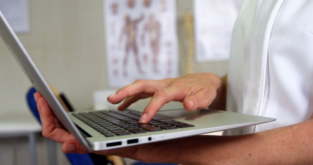 Female physiotherapist using laptop in clinic 4k - Free Images, Stock Photos and Pictures on Pikwizard.com