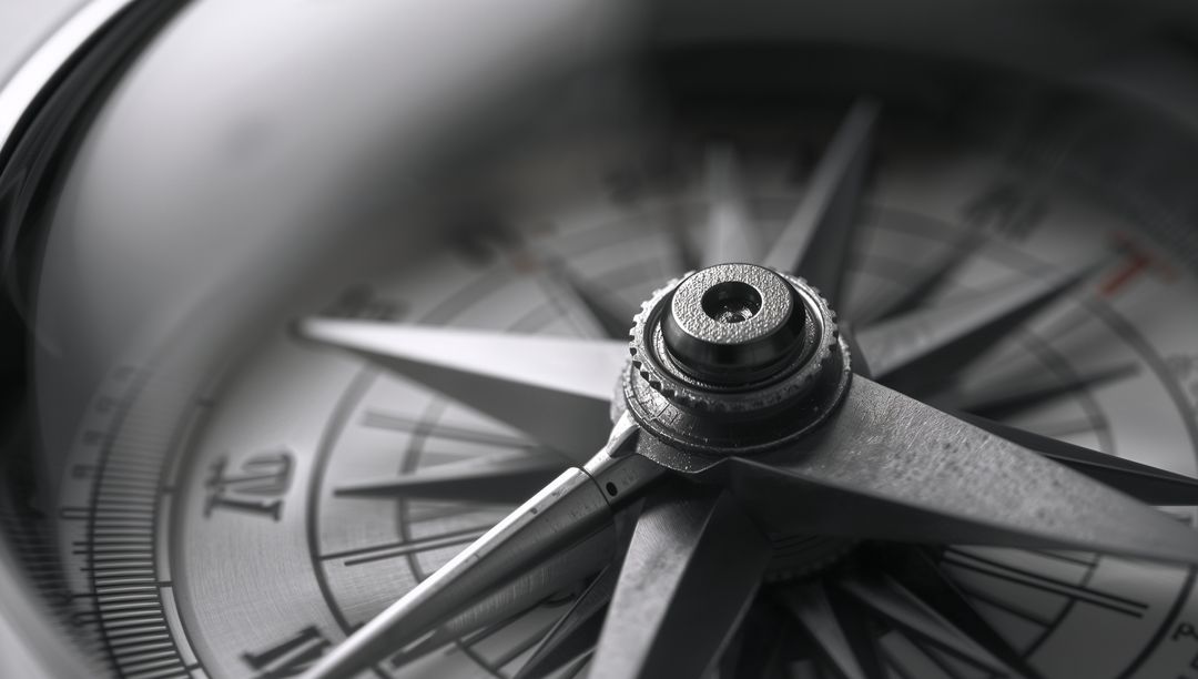 Macro Brass Compass Rose Closeup Showing Precision Pivot Screw and Glass Dome Navigation
