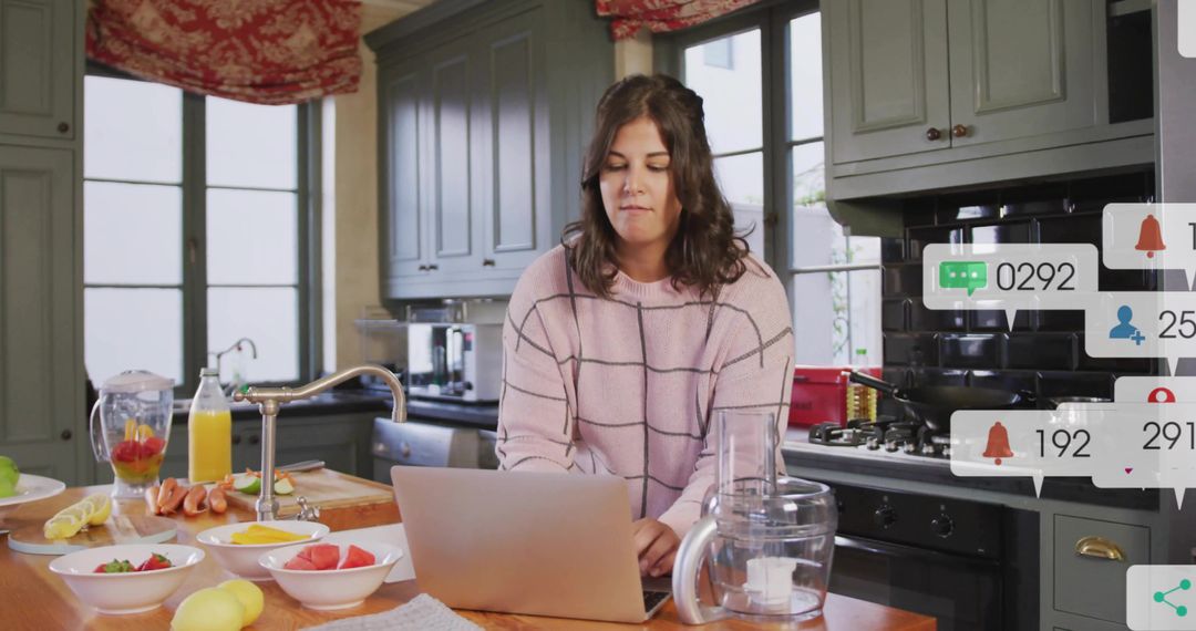 Woman Working Remotely While Preparing Healthy Meals in Kitchen