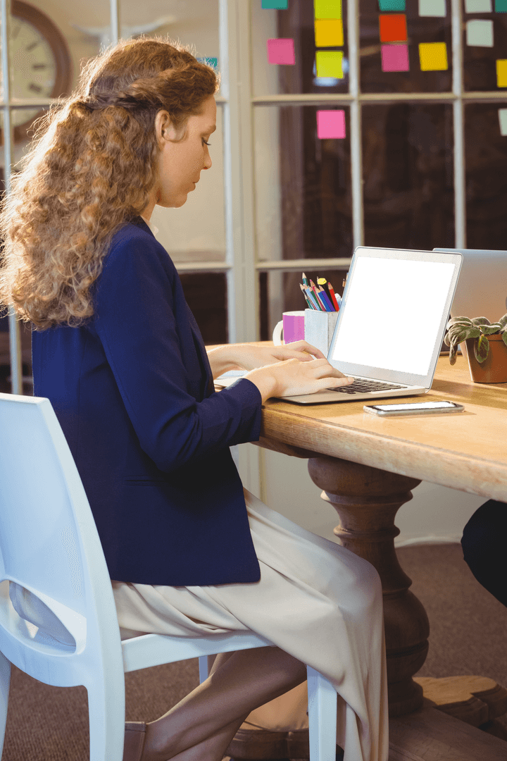 Business Woman Typing on Transparent Matrix Screen at Workspace