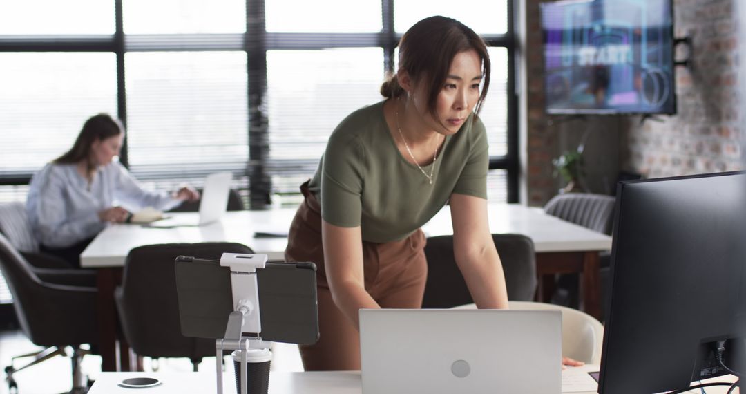 Focused Business Professional Working in Modern Office Space