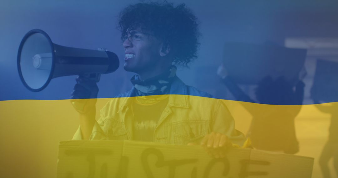 Ukrainian Flag Overlay on African American Protester Calling for Justice - Free Images, Stock Photos and Pictures on Pikwizard.com