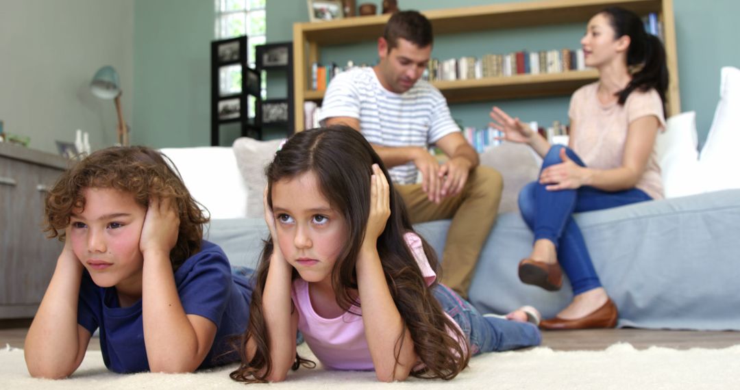 Children Covering Ears While Parents Arguing at Home - Free Images, Stock Photos and Pictures on Pikwizard.com