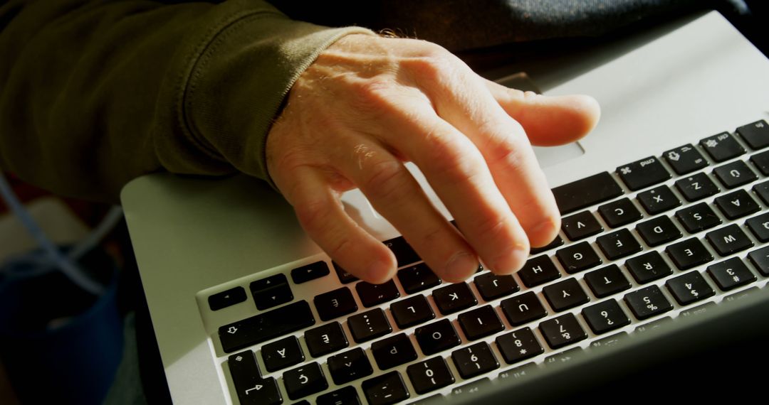 Close-Up of Person Typing on Laptop Keyboard - Free Images, Stock Photos and Pictures on Pikwizard.com