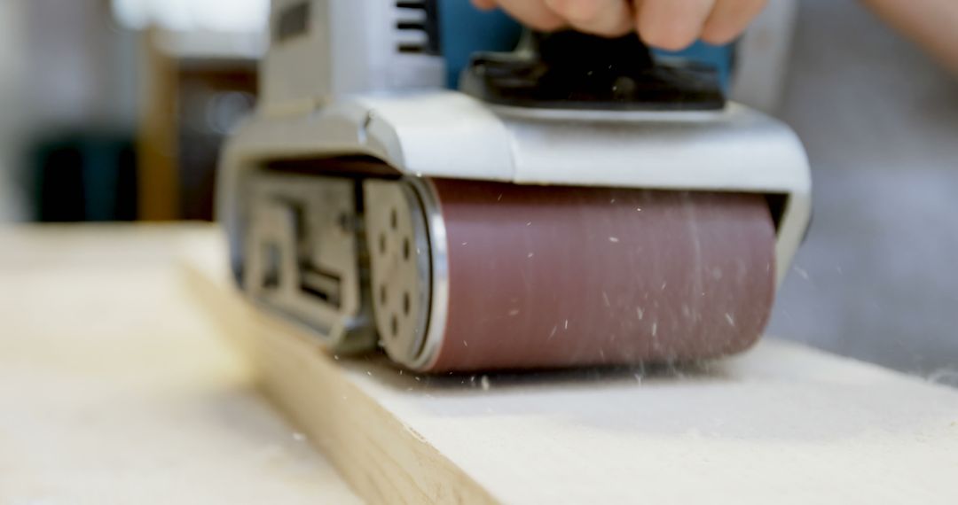 Close-Up of Electric Sander Smoothing Wooden Surface - Free Images, Stock Photos and Pictures on Pikwizard.com