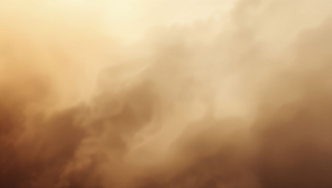 Golden cloudscape with warm haze and soft shadow pockets for atmospheric backgrounds