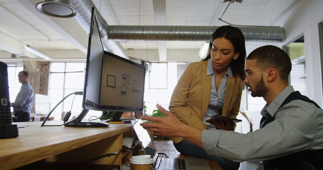 Focused Business Team Collaborating in Modern Office Environment