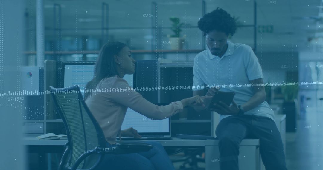 Collaborative Professionals Analyzing Data in Modern Office