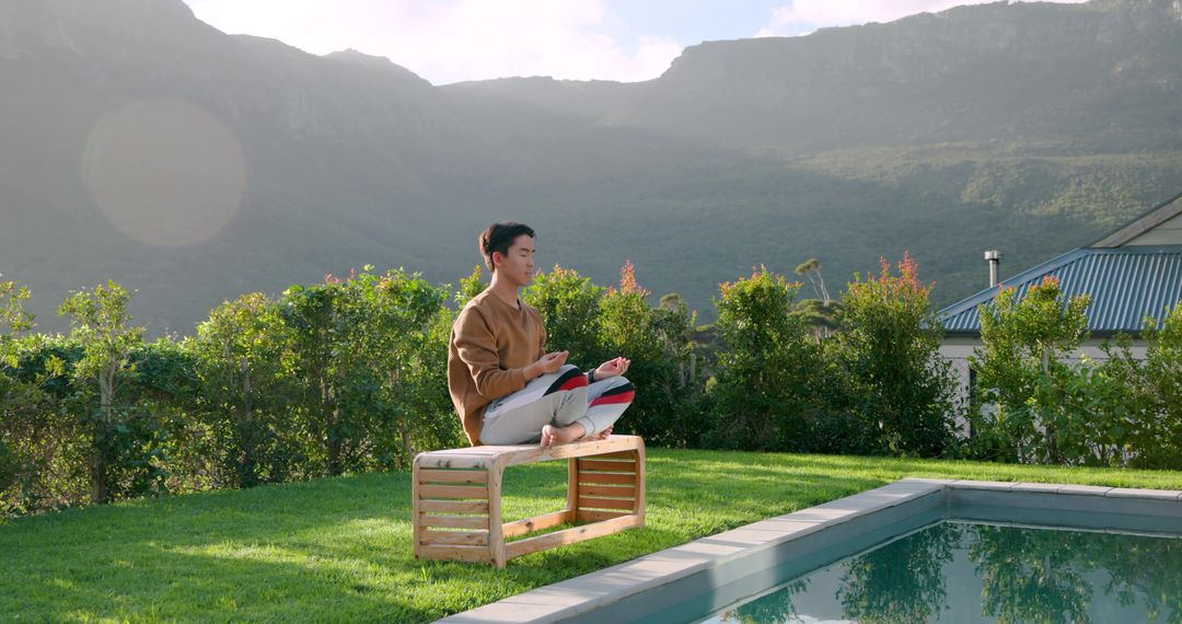 Serene Meditation by Pool with Scenic Mountain View