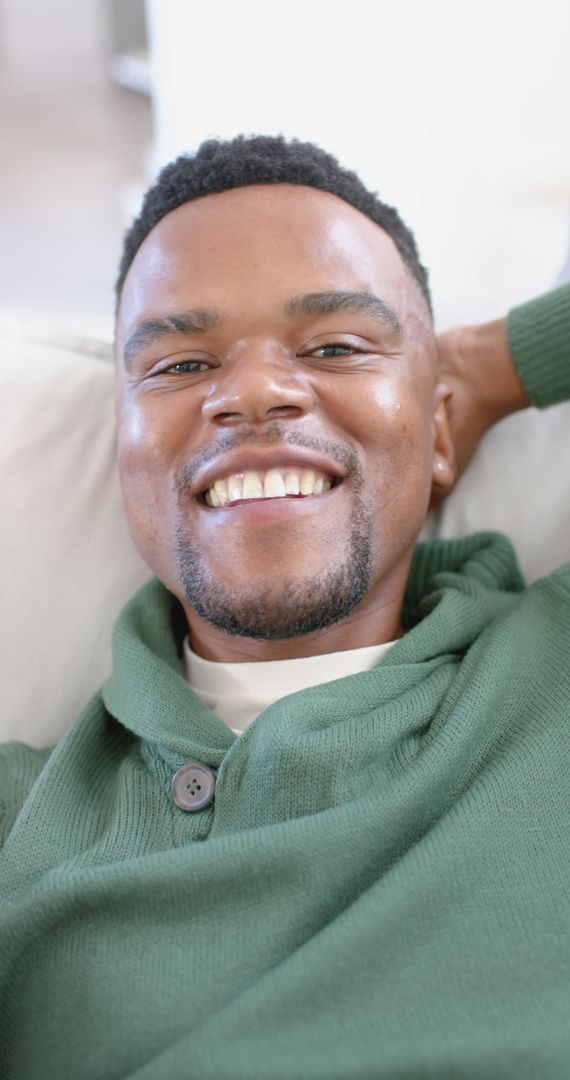 Smiling Man Enjoying Relaxed Online Conversation