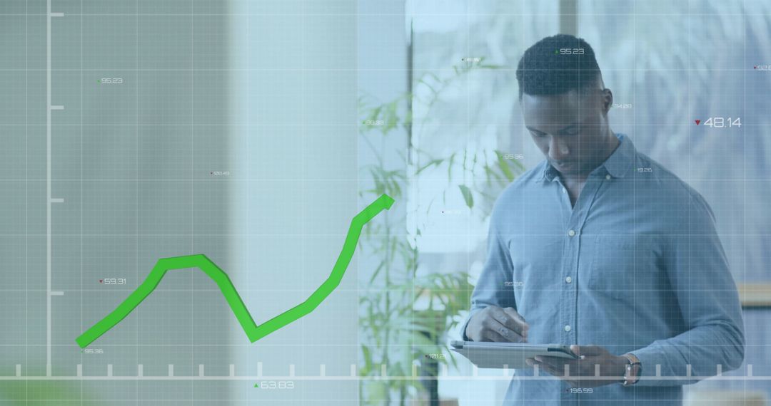 Businessman Analyzing Financial Data with Digital Graph Overlay