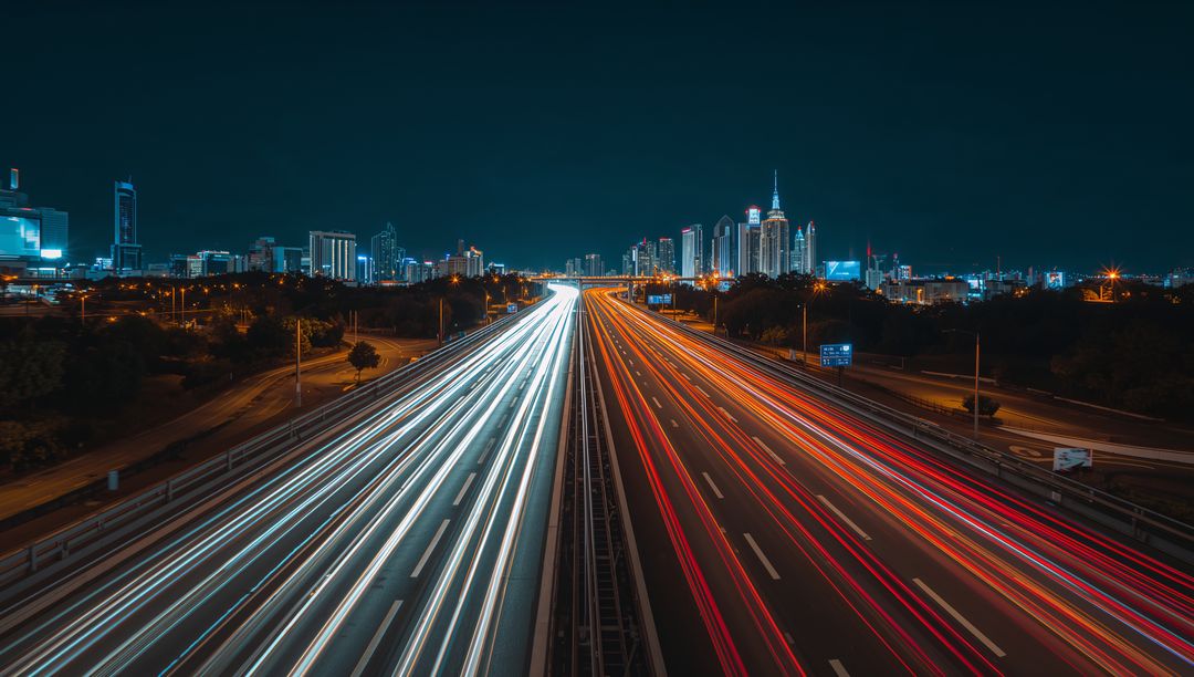 Dynamic Urban Freeway with Light Trails at Night
