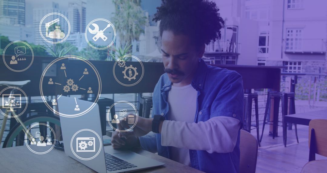 Technology Icon Network Surrounding Man Using Laptop