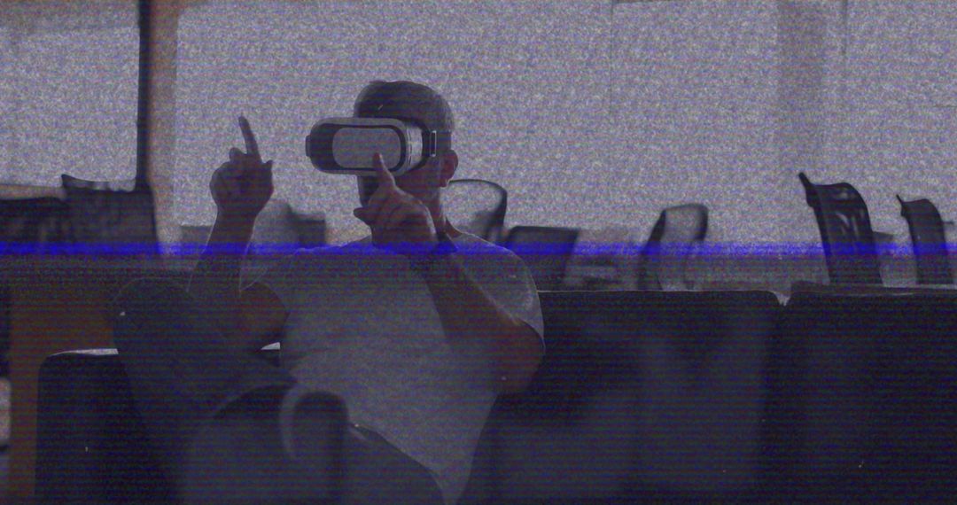 VHS Glitch Effect Over Man Using VR Headset in Office