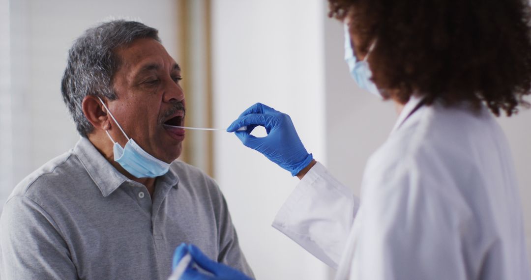 Healthcare Worker Performing Swab Test on Patient - Free Images, Stock Photos and Pictures on Pikwizard.com