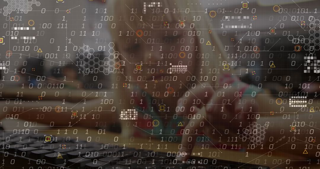 Young girl learning computer programming with digital data overlay