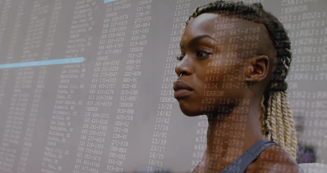 Focused Woman Analyzing Data Codes with ERROR Overlay