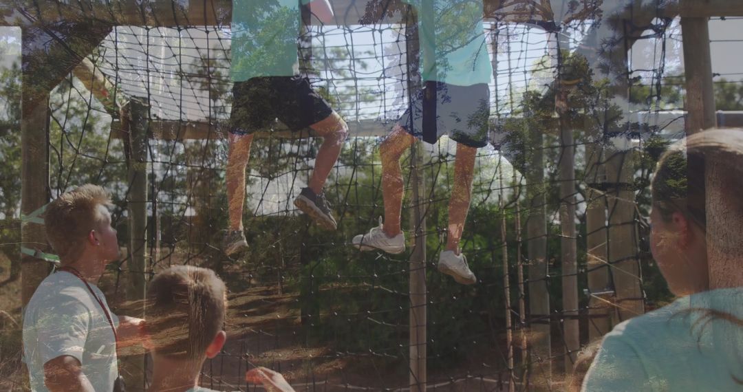 Children Climbing Adventure Course in Park with Safety Measures
