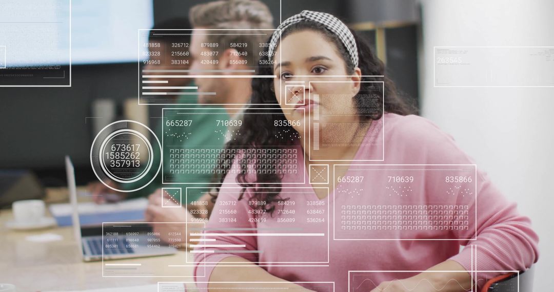 Financial Analysts Collaborating with Data Visualizations in Office