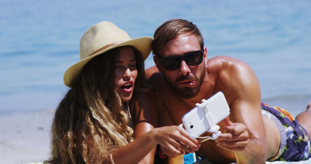 Couple Taking Selfie at Tropical Beach - Free Images, Stock Photos and Pictures on Pikwizard.com