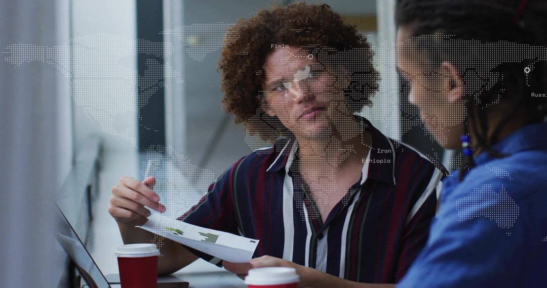 Business team discussing global sales report, laptop and coffee, analyzing charts and maps