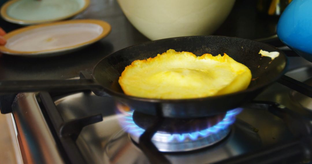 Close-up Pancake Cooking in Skillet at Home