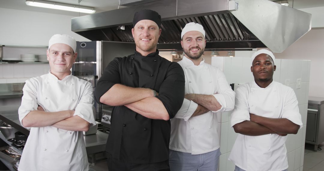 Group of Professional Chefs Smiling and Standing Together in Kitchen - Free Images, Stock Photos and Pictures on Pikwizard.com